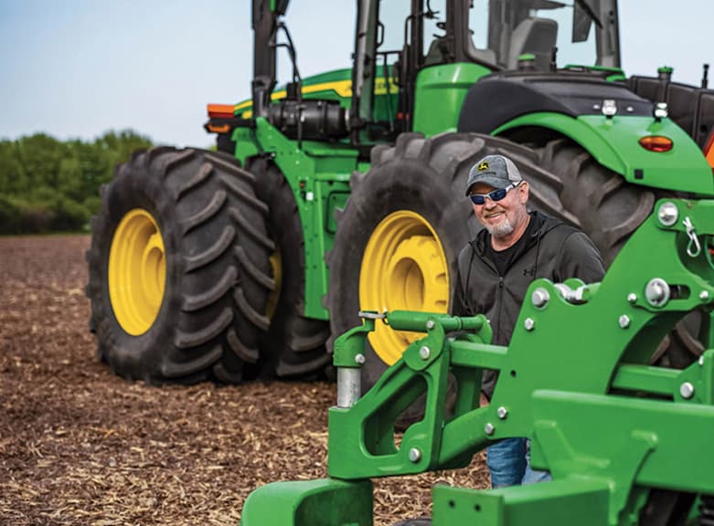 Man enjoying benefits of John Deere uptime and reliability